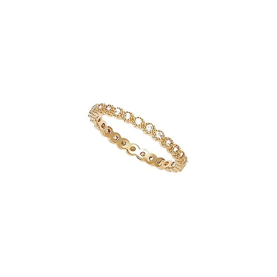 bague fine de type alliance avec tour de zircon en plaque or