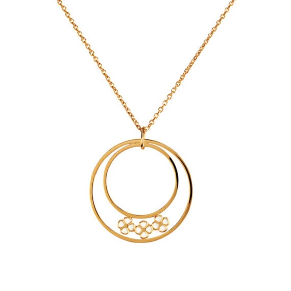 Collier fantaisie bali, zoom sur le pendentif doté de cercles et de fleurs