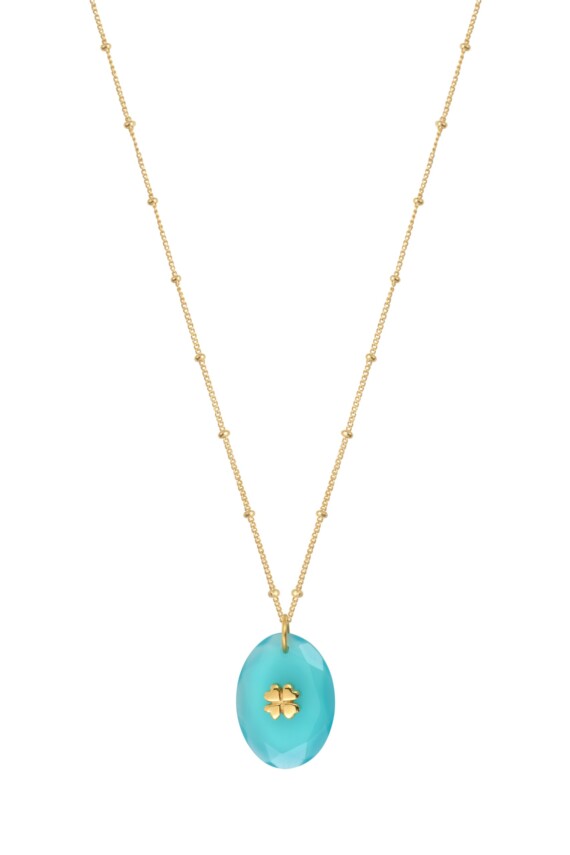 Collier avec une pierre naturelle calcedoine en pendnetif. Un petit trèsfle en plaqué or est incrsuté dessus. En vente dans la bijouterie de créateurs Poisson Plume.