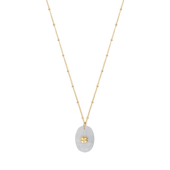 Collier doté d'un pendentif en pierre de lune. Un petit trèfle en plaqué or est inséré dessus.