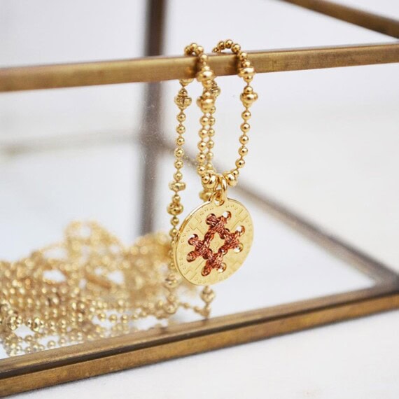Collier médaille dorée et cuivrée