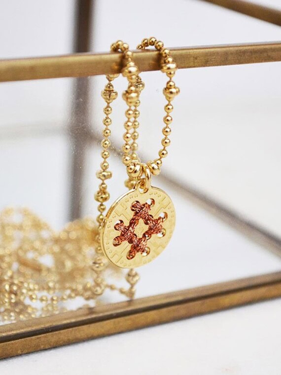 Collier médaille dorée et cuivrée