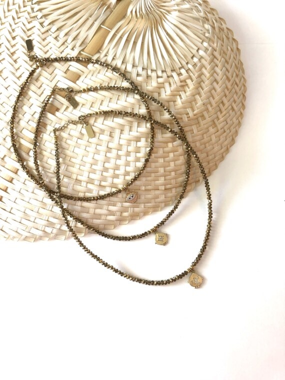 collier quartz médaille lyncée doré chez poisson plume