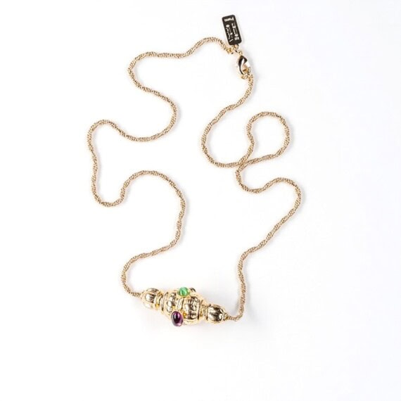 collier toupie moulin chez poisson plume bijoux