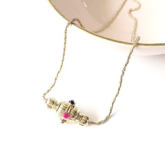 collier toupie moulin chez poisson plume bijoux
