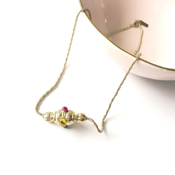 collier toupie moulin chez poisson plume bijoux