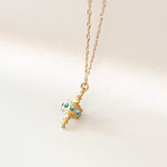 collier toupie turquoise chez poisson plume bijoux