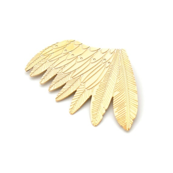 grande broche plumage dorée