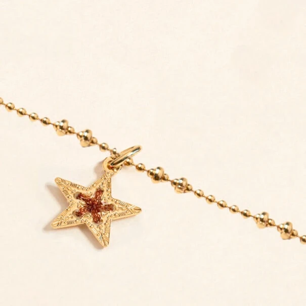 Collier amulette étoile
