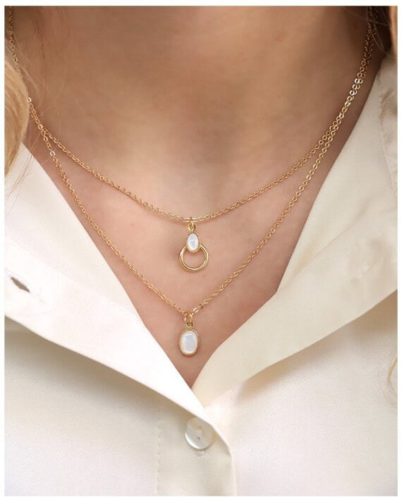 Colliers collection saturne pendentifs ovales nacre