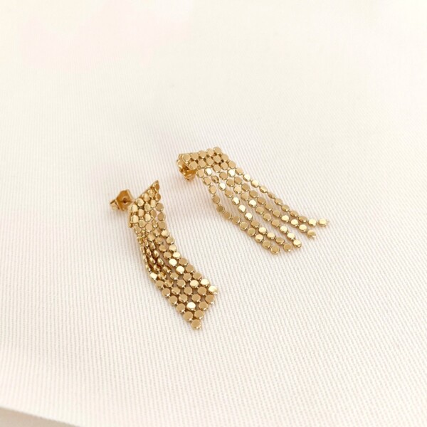 Boucles d'oreilles disco. Boucles longues dorées.