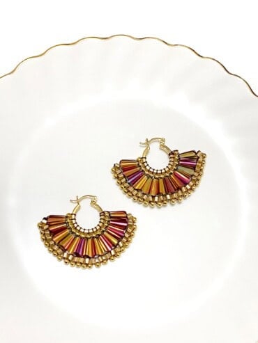 Boucles Serpiente Emplumada Magenta