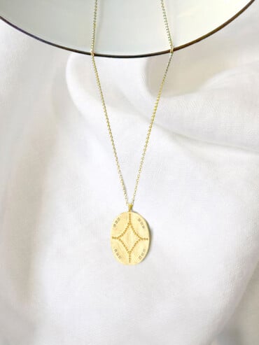 Collier médaille sahara