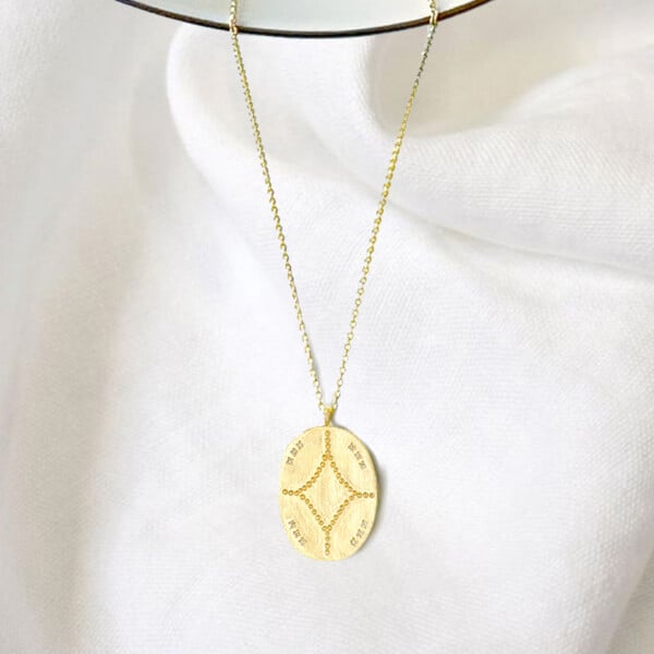 Collier médaille sahara