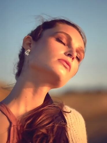 Puces d'oreilles plumes canopée femme