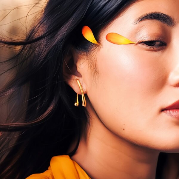 Boucles d'oreilles symbiose dorées femme