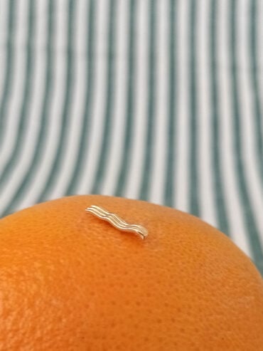 Mono boucle dorée ondulée Corto Ozio