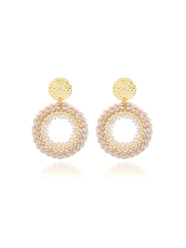 Les 10 tendances bijoux fantaisie de l'été 2024 14 Boucles atacama blanc sable