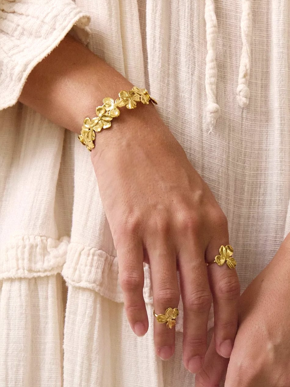Bracelet fleurs Antikyra 5 Bracelet fleurs antikyra - Jonc ouvert ajustable doré - modèle femme pour petit poignet.
